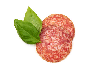 Traditional white salami sausage slices, isolated on white background.