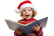 © David - A cheerful child wearing a Santa hat reads a book excitedly, embodying the festive spirit of the holiday season in a bright and joyful atmosphere isolated on transparent background