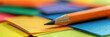 © 2rogan - Close-up of a student's pencil resting on a vibrant collection of flashcards