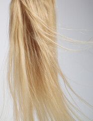 blond hair extension flying 