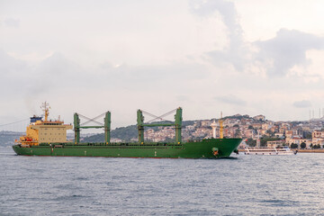 Aufkleber - Cargo ship moving through the Bosphorus near Istanbul, highlighting the busy