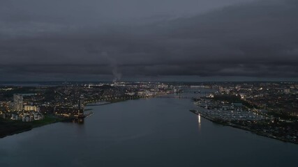 Wall Mural - Aerial panoramic night skyline cityscape of Aalborg, North Jutland Region (Nordjylland), Denmark.
