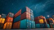 © NATTAWUT - Close-up of stacked shipping containers under night sky at a busy port terminal