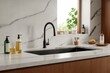 © HEKOLA - A kitchen sink with a black faucet and a white countertop
