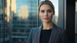 © SuperStockGallery - Confident Businesswoman Looking at Camera in Modern Office Building.