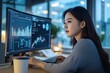 © sogap - A serious Korean woman in a corporate setting, focused on financial analysis displayed on her computer screen