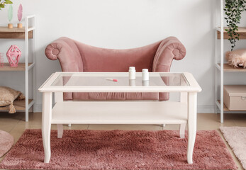 Wall Mural - Pregnancy test and pill bottles on table in living room