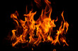 © Korneliia - Fire flame background. Fire flames. Campfire texture. Flaming bonfire. Fire wallpaper. Bonfire background with copy space. Blaze fire flame texture background.