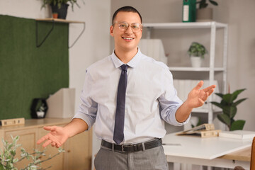 Canvas Print - Portrait of handsome businessman in office