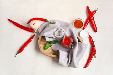 Canvas Print - Jar of tomato sauce with basil and chili peppers on white background