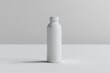 © adri - White Plastic Bottle with White Cap on a White Background