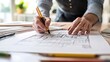 © Deeko NKS - Designer sketching out a home layout, focus on customization