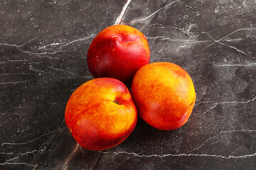 Canvas Print - Ripe sweet juicy fresh red nectarines