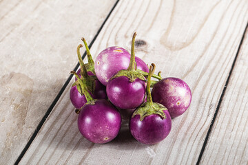 Wall Mural - Raw small purple asian baby eggplant