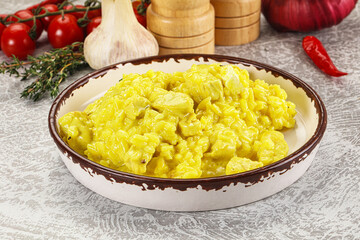 Wall Mural - Italian cuisine - yellow risotto with chicken