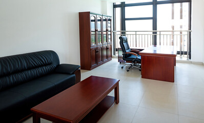 Table and armchair in modern office