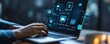 © Thanaseth - Person using laptop with compliance icon on virtual display, ensuring business policies and regulatory compliance