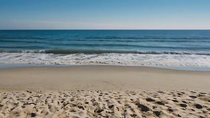 Wall Mural - Landscape view of a beautiful beach with waves of water coming to shore, seaside view under daylight