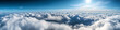 © N. W. - panoramic view from above the clouds in the sky as a motivation concept