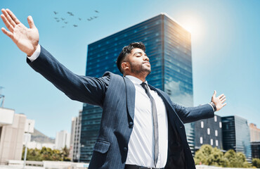 Wall Mural - City, business and man with open arms, achievement and happiness with positive mindset, New York and carefree attitude. Person, attorney and lawyer with gesture, outdoor and celebration with freedom