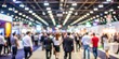 © Triple P - Blurred background of a crowded public event exhibition hall, event, exhibition, blurred, background, public, hall
