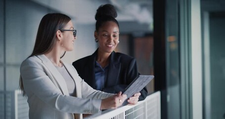 Poster - Female CEO and a Project Manager Standing in a Modern Office in Downtown Area. Black and Caucasian Women Setting Up Business Meetings On a Tablet Computer in a Fintech Startup