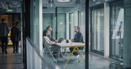 Aufkleber - Team of Female and Male Managers Having a Discussion with a Corporate Business Adviser in an Office Meeting Room. Group of Businesspeople Analyzing Financial Reports, Brainstorming New Ideas