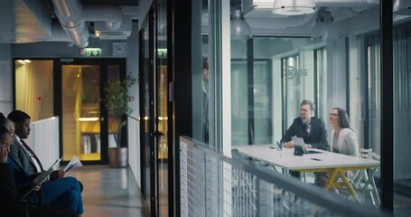 Aufkleber - Human Resource Specialist and an Executive Manager Greeting a Male Candidate for a Job in Marketing in an International Business Company. Other Diverse Applicants Waiting Their Turn