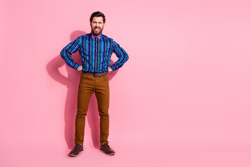 Poster - Full length photo of mad furious man wear stylish clothes hand waist empty space isolated on pink color background