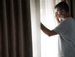 © JosLuis - A sad and thoughtful man looks out of a window.Depression and anxiety are two of the major illnesses that affect mental health.