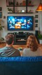 © Sasa Visual - A couple enjoys a relaxed evening at home, sitting together on a couch and streaming entertainment on a large television