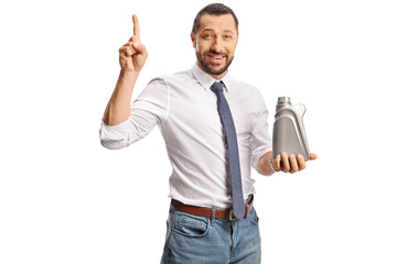 Poster - Businessman holding an engine oil plastic bottle and pointing up