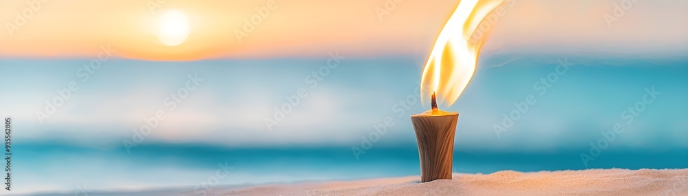 A tiki torch-lit beach party, with flames casting a warm glow over the ...