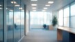 © Taras Vykhopen - Modern office interior with blurred perspective and natural lighting during daytime work hours