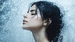 © Iswanto - Close-up portrait of a young woman with wet hair and a splash of water on her face.