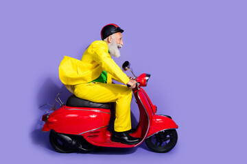 Poster - Profile photo of crazy positive man wearing yellow trendy clothes riding fast isolated on purple color background