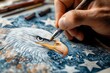© Xyeppup - A close-up of a hand skillfully drawing a detailed eagle portrait against a starry blue background, showcasing artistry and precision