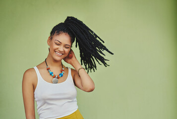 Sticker - Woman, pride and dreadlocks in studio for fashion, stylish clothes and cool look with confidence. Female person, jewelry or trendy accessory by mockup space for laughing, hair and green background