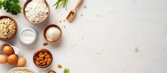 Wall Mural - Cook on a white background with available space for writing Table with bowls for cereals. Copy space image. Place for adding text and design