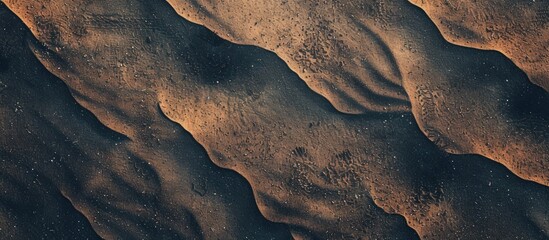 Wall Mural - Top view of textured sand with a color filter and copyspace