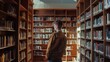 © VK Studio - A person stands in the middle of a sunlit library aisle, surrounded by tall shelves filled with books, capturing a moment of contemplation.