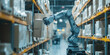 © syhin_stas - White robotic arm is lifting a package from a shelf full of cardboard boxes in a large warehouse. The robot is working autonomously in a fully automated storage facility