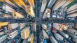 © VIK - Drone view of elevated roads and traffic junctions in a modern city, illustrating urban planning and traffic management