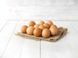 © Olha Ye - Brown fresh eggs on a wooden table. Concept of farm products, Happy Easter. World egg day October 9. Copy space