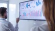© CALMANDRELAX STUDIO - Professional team analyzing data on a large screen, discussing statistics and performance metrics in a modern office setting.