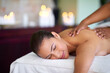© ThurstanJam/peopleimages.com - Woman, customer or hands in back massage for recovery, body circulation treatment or resting. Masseuse, relax or client on break for soothing muscle therapy, holistic healing and detox service at spa