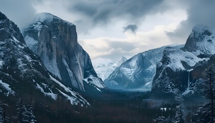 The towering mountains covered with ice and snow reveal magnificent natural scenery under the cloudy sky.