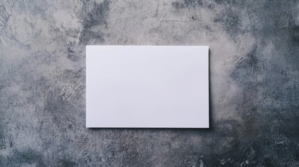 Wall Mural - A white card is on a grey background