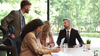 Poster - Group of business partners discussing ideas and planning work in office.