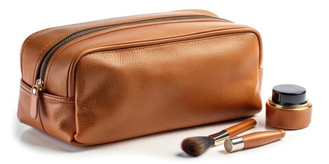 A stylish, compact tan leather bag with a simple design, perfectly sized for storing makeup essentials and small personal items while on-the-go.